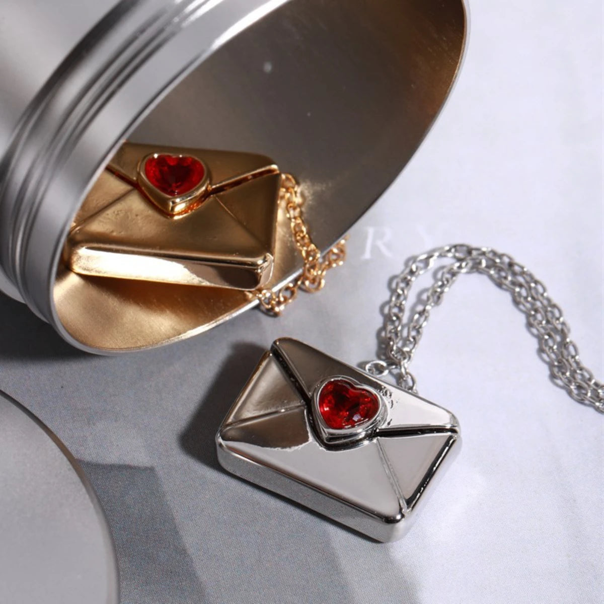 Yukona Crimson Mail: Heart-Inlaid Envelope Necklace